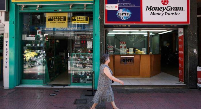 Western Union может купить MoneyGram