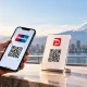 Японские финкомпании внедряют ИИ-перевод и трансграничные QR-платежи